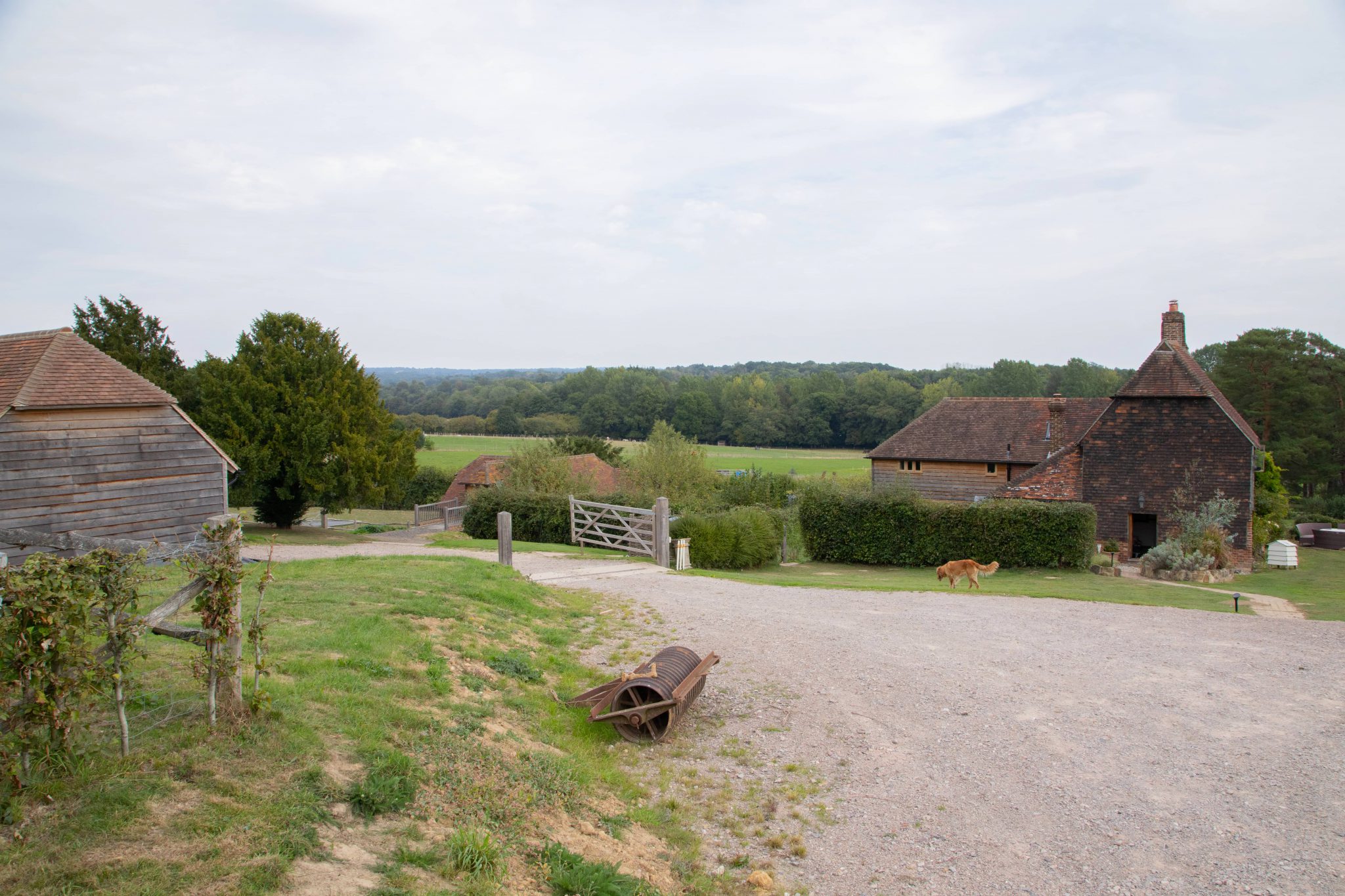 Extension to Grade II listed cottage, new stable block and garage, East